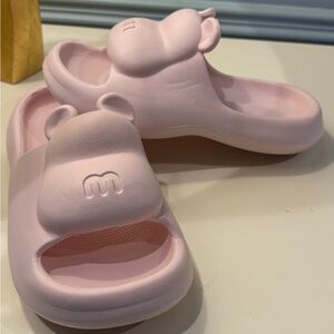 Nike Pink Slippers with Molded Footbed and Sleek Design